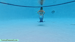 xsiteability.com - Carissa in the mermaid tail swimming and blowing bubbles in the pool thumbnail